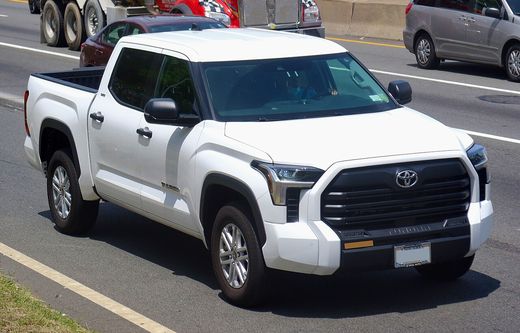 A white 2022 Toyota Tundra CrewMax SR5 seen from the front left